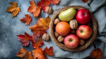 Autumn Still Life with Apples Pears Walnuts and Maple Leaves photo