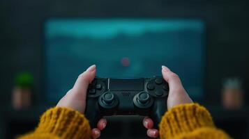 A person holding a game controller in front of a television photo