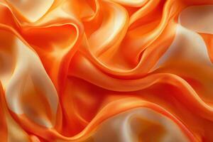 Abstract Orange and Cream Fabric Draped in Soft Waves photo