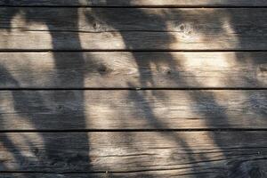 Wooden Planks with Light and Shadow Patterns photo