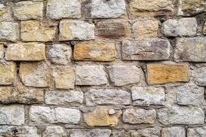 Close-Up of a Weathered Stone Wall photo