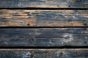 Weathered Wooden Planks with Rusting Nails photo
