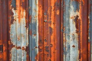 Close-up of Rusted Corrugated Metal Sheet photo