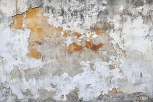 Weathered Concrete Wall with Peeling Paint photo