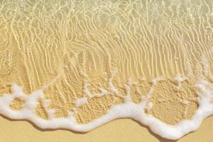 Foamy Wave Edge with Light Reflecting on Sandy Seabed photo