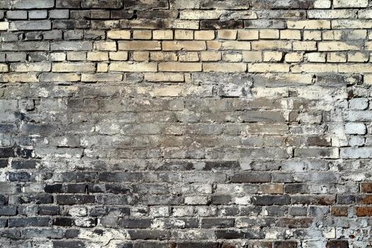 Weathered Brick Wall with Flaking Paint and Mortar photo