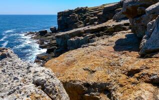 Coastal cliffs from the north side of Serpent's -Zmeinyi- Island, Ukraine photo