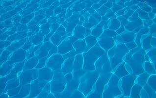 The reflection of the suns rays in the water in the pool with sea water, The glare of the sun, Egypt photo
