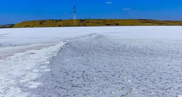 covered with a layer of white self-precipitating common salt photo
