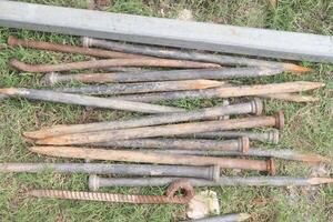 iron tent stake stock on field photo