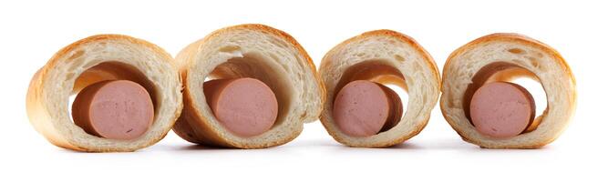 Sausages in dough cut in half isolated on a white background.Sausage in dough. photo