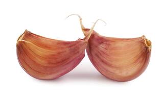 Two cloves of garlic isolated on a white background. Garlic cloves on white. photo