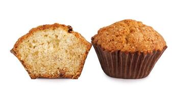 Whole and half muffin isolated on white background. photo