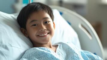 Central Asian Boy Smiling While Lying in Hospital Bed Wearing Patient Gown, Healthcare and Recovery Scene photo