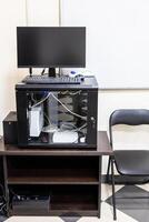 pedestal with server, router, computer monitor photo