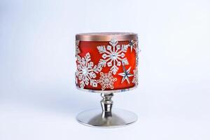 New Year's beautiful decorated snowflakes candlestick on a white background. photo