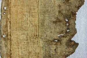Very old fabric is spoiled by time. top view. close-up photo