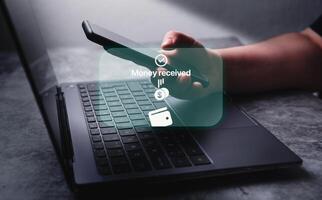 Woman transfering money online using apps on smartphone. Selective focus. Concept of financial transactions with mobile devices. Smartphone screen displaying money transfer confirmation. photo