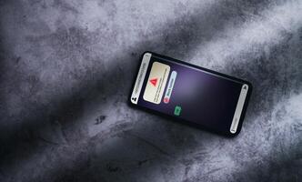 Smartphone receives message from suspected number scam. Unwanted anonymous call. Fraud and phishing phone concept. Message from stranger. photo