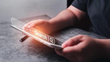 Woman use digital tablet for searching online. Data Search Technology Search Engine Optimization. SEO concept. VR interface for browsing on internet. photo