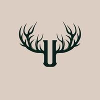 The letter u is shown in a deer head vector