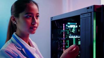 Woman IT specialist fixing server rack glowing LED engineer system administrator girl software hardware security cloud computing AI expert specialist technology data center network video