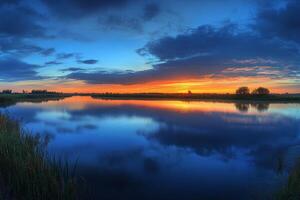 Breathtaking sunset reflecting on calm lake water in kinderdijk photo