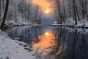 Golden sunset reflecting on a river in the forest during wintertime photo
