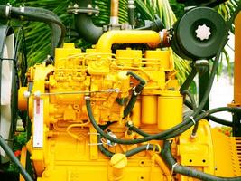 large mobile industrial water pump system used for irrigation, flood control, industrial processes, machinery, mounted on a wheeled platform, features a robust design with yellow, high functionality photo