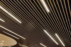 the ceiling is lit up with a series of lights photo