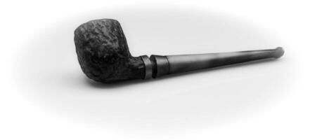wooden pipe for smoking tobacco in black and white. old style retro object on white background photo
