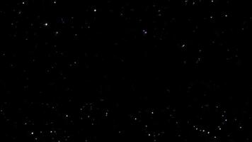 Loop flow up dust star particles on black abstract background video