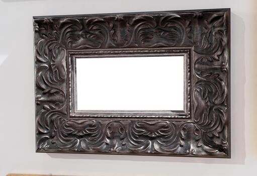 Empty frame for a picture or photo. Isolate with place for text. Silver black frame isolated on white background. Layout template photo