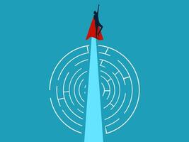 man on top of a maze with a red cape vector