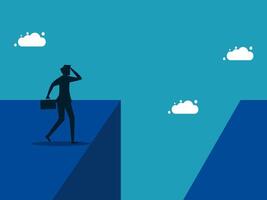 businessman standing on the edge of a cliff with clouds in the background vector