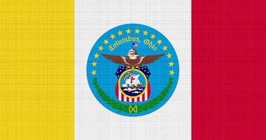 Flag of the city of Columbus, Ohio, USA, on a background of fabric texture. Conceptual collage photo
