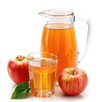 apple juice in a jug and glass and apples photo