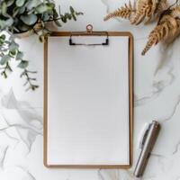 clipboard with a blank sheet of paper photo