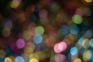 Abstract colorful bokeh defocused party lights background. photo
