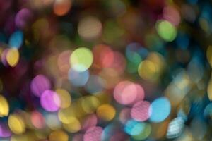 Abstract colorful bokeh defocused party lights background. Bokeh lights background. photo