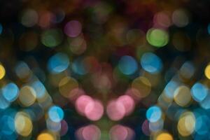 Abstract colorful bokeh defocused party lights background. Bokeh lights background. photo