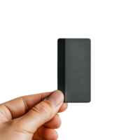 Hand holding a small black rectangular object on transparent background png
