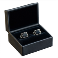 Elegant black cufflinks in a luxury box on transparent background for formal occasions and gifting png