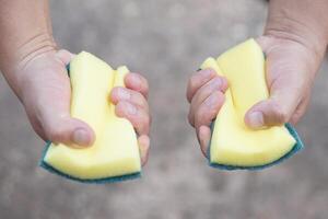 Hand muscle exercises for paralyzed patient by squeezing soft sponge. Concept, Healthcare. Wisdom to apply using thing for physical therapy to strengthen or recovery weak muscle symptom. photo
