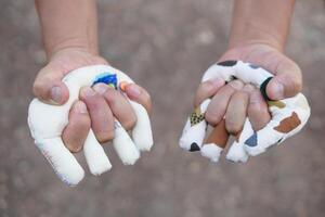 Hand muscle exercises for paralyzed patient by squeezing soft objects stuffed with sponges that fit with fingers locking. Concept, Healthcare for physical therapy to strengthen or recovery weak muscle photo