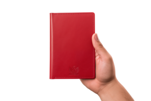 Hand Holding A Red Leather Passport Cover Isolated On A Transparent Background png