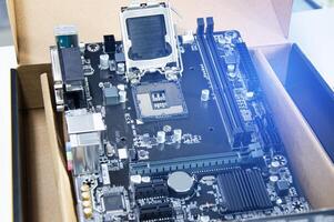 Top view of computer motherboard. Computer components. Motherboard and circuitry. photo
