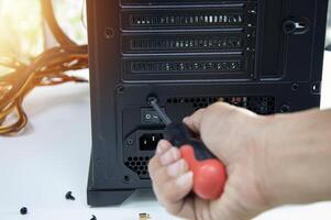 Technicians are assembling and repairing computers. photo