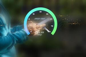 fast internet connection speedtest network bandwidth technology Man using high speed internet with smartphone and laptop computer. 5G quality, speed optimization. photo