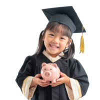 Smiling little girl wearing graduation gown uniform standing with hand holding piggy bank isolate on transparency background png